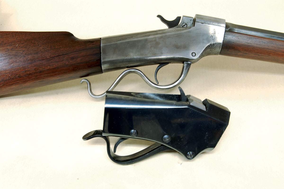 The Falling Block Works (FBW) Model H (bottom) is similar to the 1870s Ballard (top) except for the greater breechblock support for the Model H.